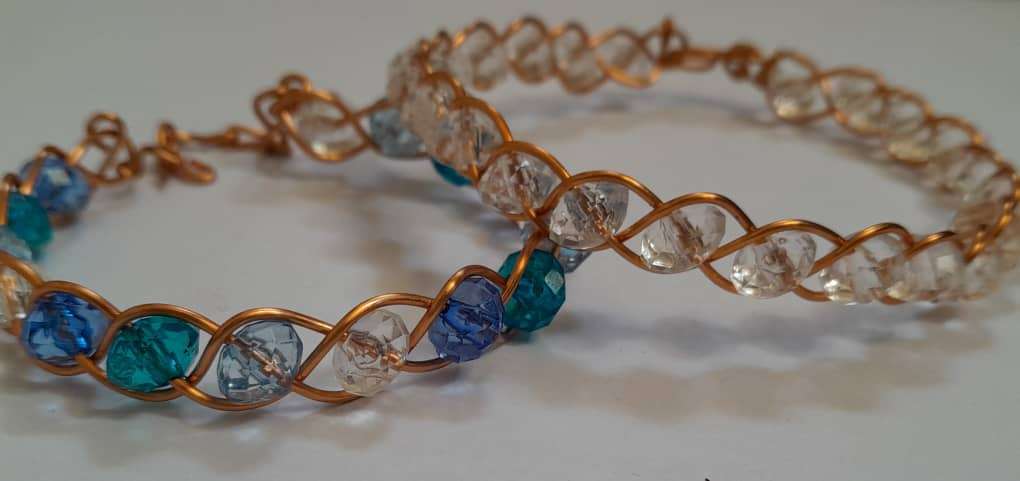 Single strand eye bracelets