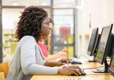 focused-female-student-excited-with-online-test_74855-1901-1